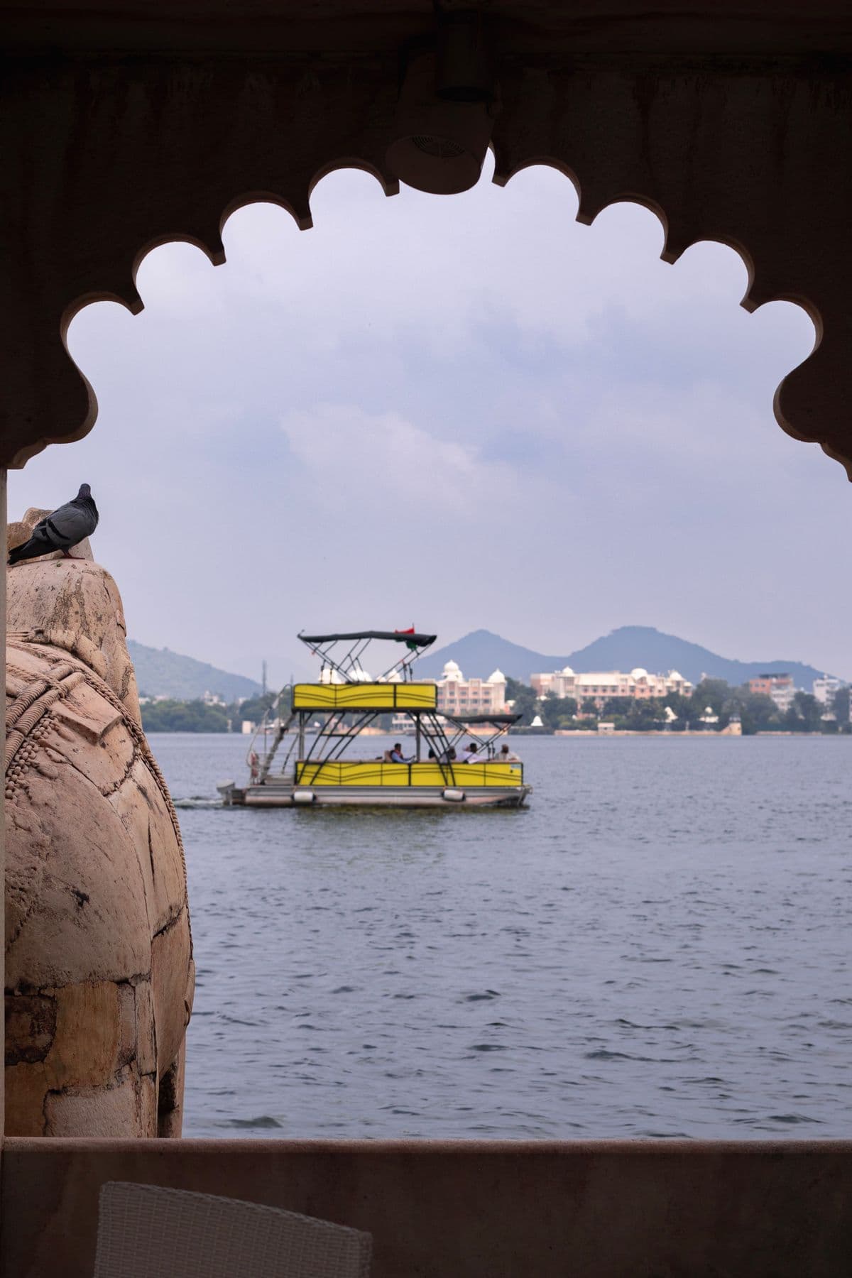 Lake Pichola through ornate arch